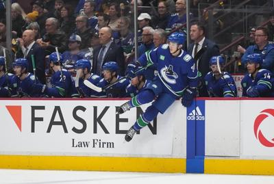 Canucks sign defenceman Akito Hirose to two-year deal