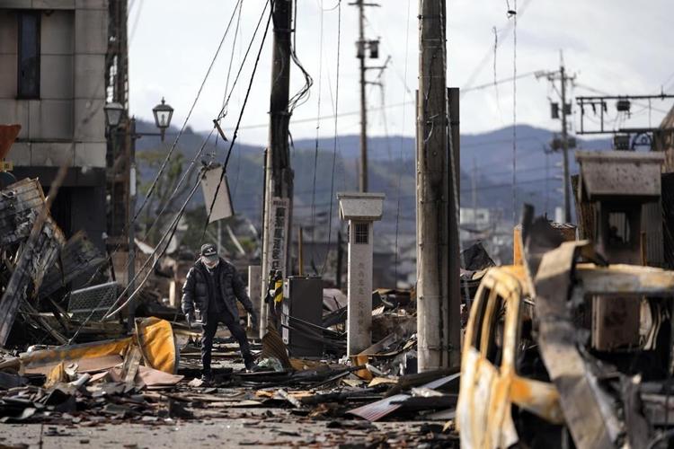 Western Japan earthquakes have claimed 100 lives; rain and snow imperil already shaky ground