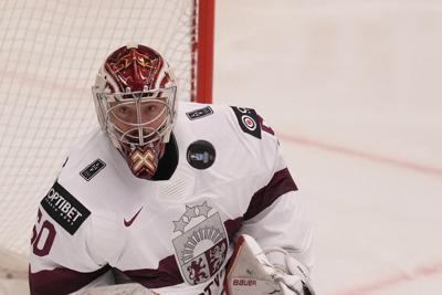 Latvia beats Kazakhstan 2-0 at hockey worlds. Norway tops Denmark