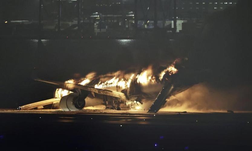 Planes collide and catch fire at Japan's busy Haneda airport, killing 5. Hundreds evacuated safely