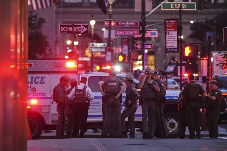 A shooting at a midtown Manhattan office building, in photos