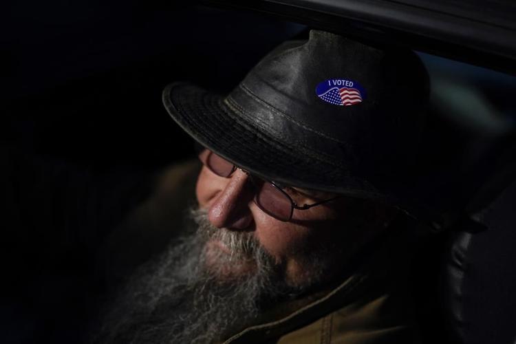 AP Photos: America votes in laundromats, schools, libraries