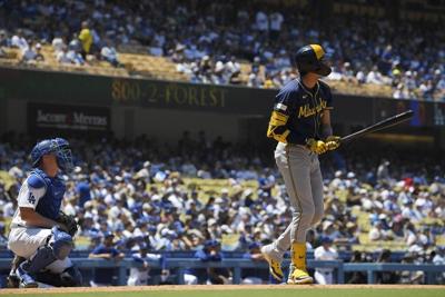 Brewers All-Star Yelich placed on IL, will see specialist to determine if back surgery is needed