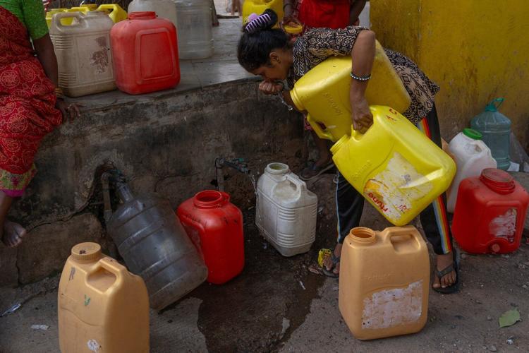 Delayed rains bring water shortages to cities and uncertainty to farms across India