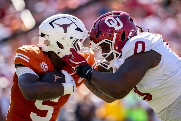 The Latest: Big shakeups in store for the college football top 10 of the AP Top 25 coming soon