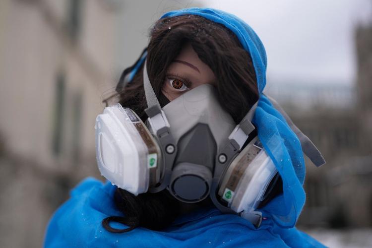 Church Nativity scenes add zip ties, gas masks and ICE to protest immigration raids