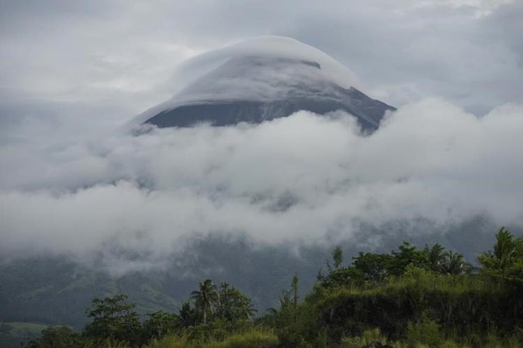 Philippines' Mayon Volcano spews lava in gentle eruption, thousands warned to be ready to flee