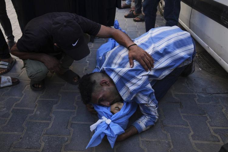 Photos show Palestinians mourning after people were killed in Israeli strikes