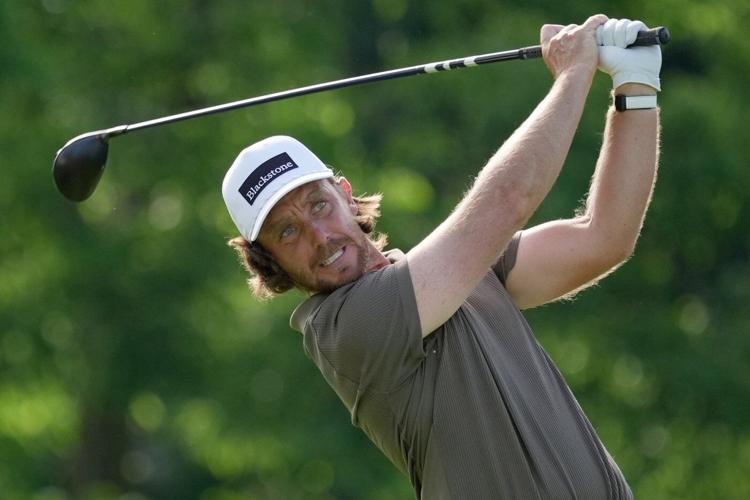 J.T. Poston handles the wind at Memorial for low round of tournament and the lead