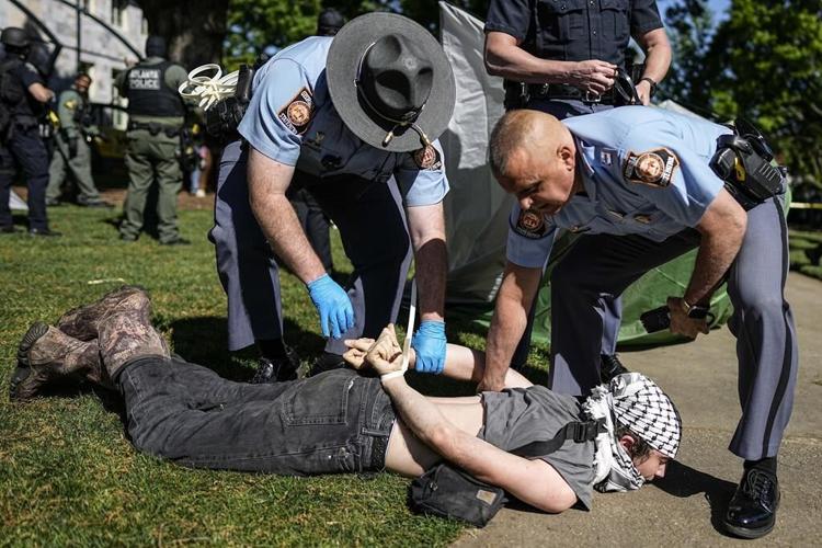 As some universities negotiate with pro-Palestinian protestors, others quickly call the police