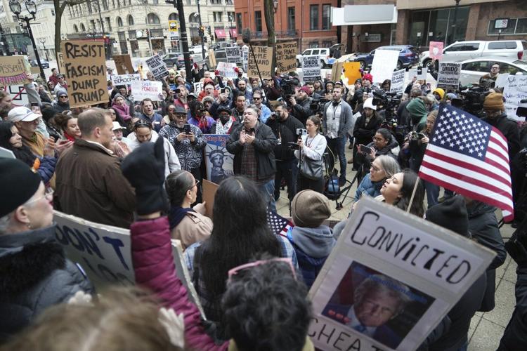 Protesters chant after arrest of judge accused of helping man evade immigration authorities