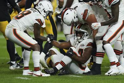 Nick Chubb's injury underscores running backs' pleas for bigger contracts and teams' fears