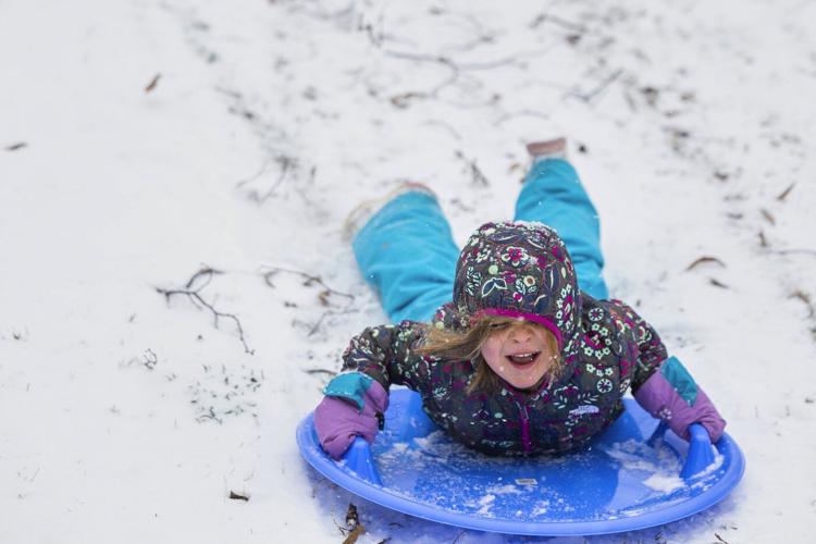 Snowy roads lead to hundreds of Virginia and North Carolina crashes as Arctic air brings record cold