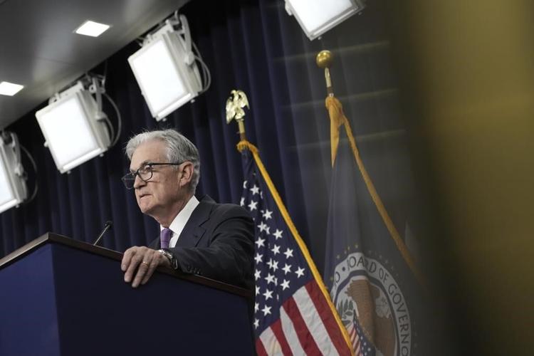 Fed keeps rates unchanged but signals likelihood of another hike this year to fight inflation