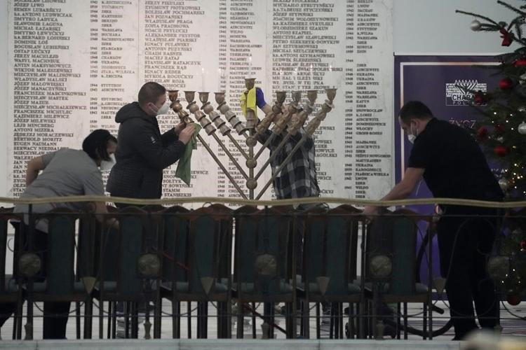 Polish far-right lawmaker extinguishes Hanukkah candle in parliament