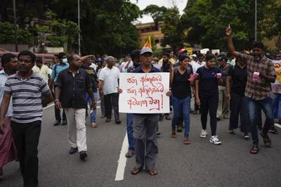 Sri Lankans rally to demand release of 2 protest leaders