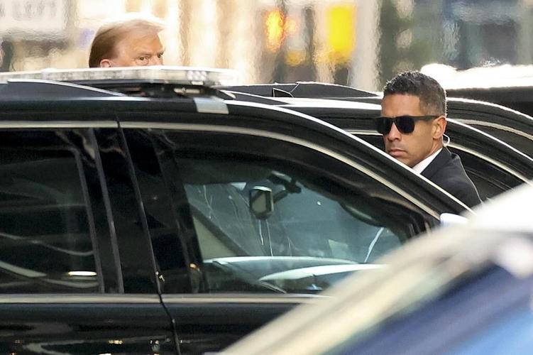 Trump arrives at court for a hearing in his hush money case after new evidence delayed his trial