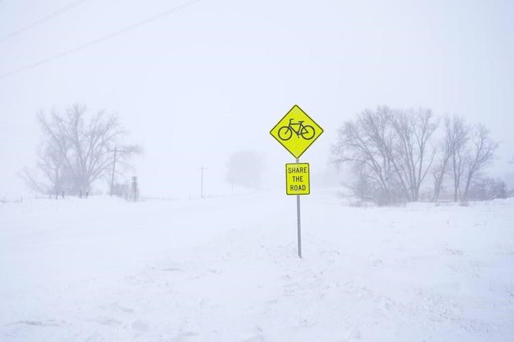 Winter storm with snow, ice, wind and bitter cold pummels much of the northern US