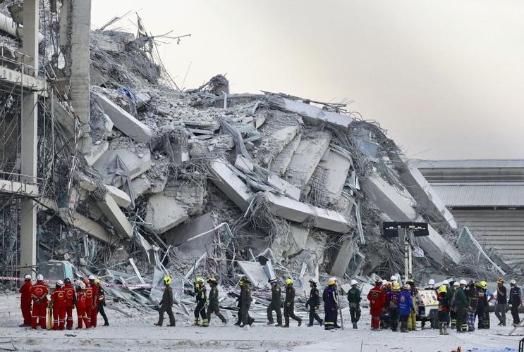 Thai-Chinese company denies flouting safety measures in probe of skyscraper collapse following quake
