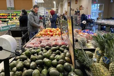 US revises up last quarter's economic growth to 2.9% rate