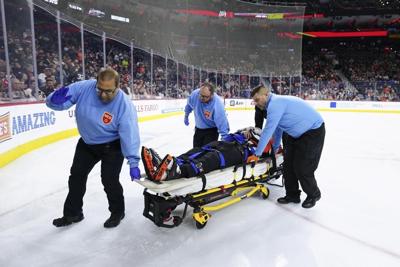 NHL referee Mitch Dunning is home and expects to make a full recovery, league says