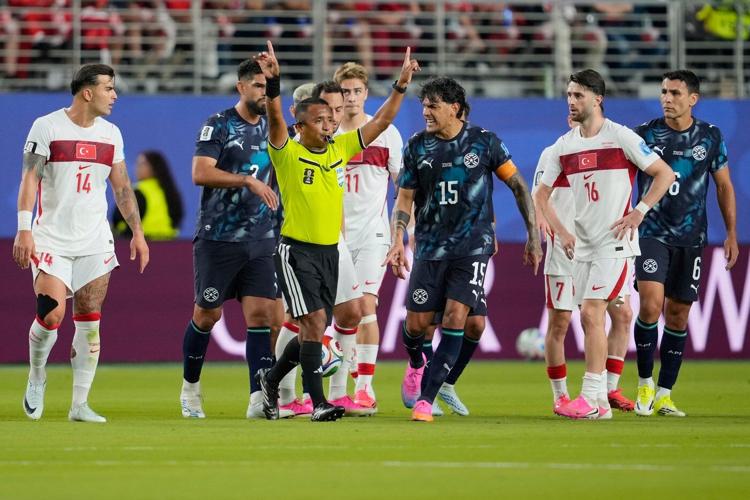 Paraguay beats Turkey 1-0 at the World Cup despite being down a man to clinch Group D for U.S.