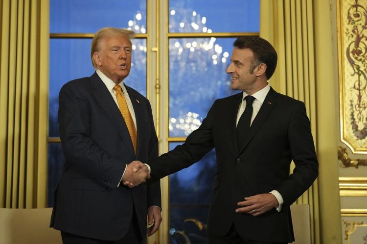Trump receives a Paris welcome full of presidential pomp from France's Macron
