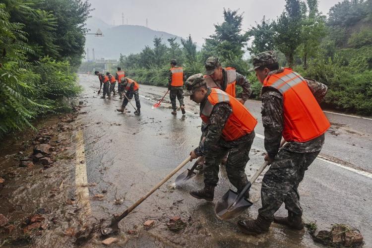 Heavy rains in northern China kill 4 as Beijing and neighboring areas issue flood warnings
