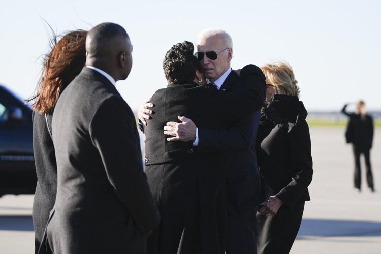 Biden visits makeshift memorial in New Orleans where attack began that killed 14 and injured 30