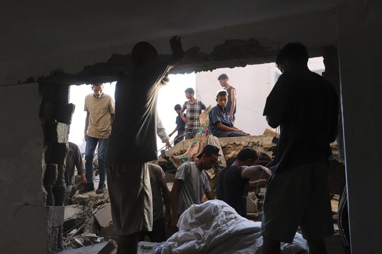 Israeli strikes kill 36 in Gaza, including a mother and newborn, as more aid is allowed in