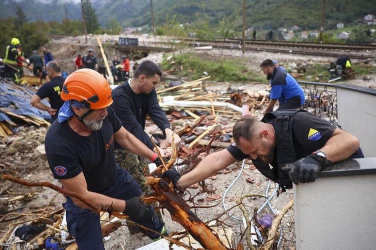 Rescue teams search for missing after floods, landslides kill at least 16 in Bosnia