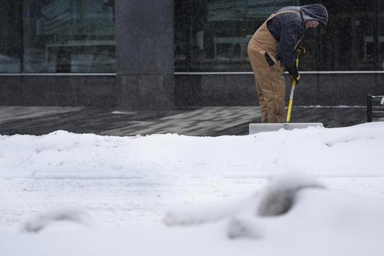 Winter storm with snow, ice, wind and bitter cold pummels much of the northern US