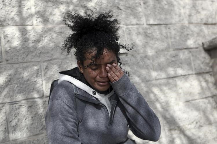 Mexico investigates 8 over deadly fire at migrant facility