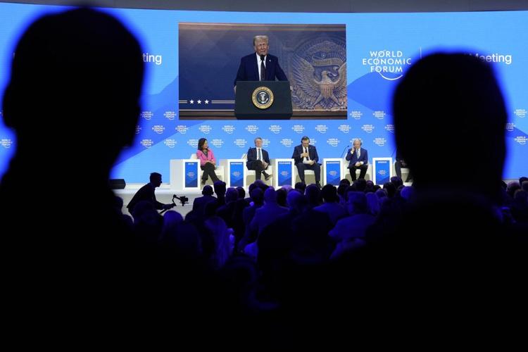 Trump tells Davos elite to invest in US or face tariffs