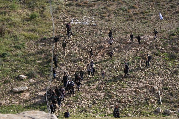 Israeli settlers block Palestinian kids' path to school with tear gas and barbed wire