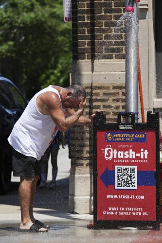 Eastern half of US sweltering again, with dangerous heat wave expected to last until midweek