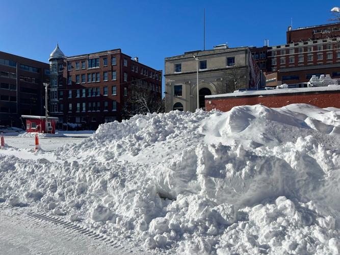 Northeast US scrambles to clear piles of snow as new storm descends on the region