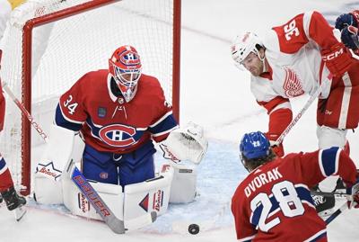 Walman scores in OT as Wings clip Canadiens 5-4