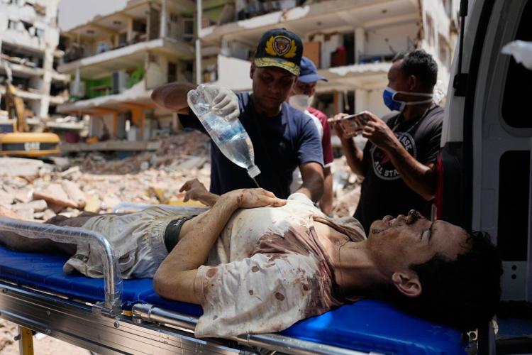 Photos show rescue efforts across earthquake-ravaged Venezuela
