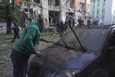 The death toll in Kharkiv attack rises to 14 as Zelenskyy warns of Russian troop movements