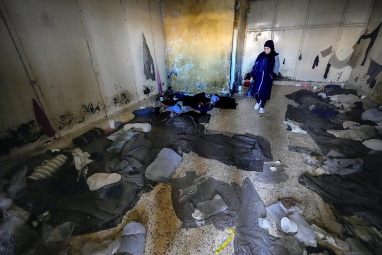 Thousands scour Syria's most horrific prison but find no sign of their loved ones