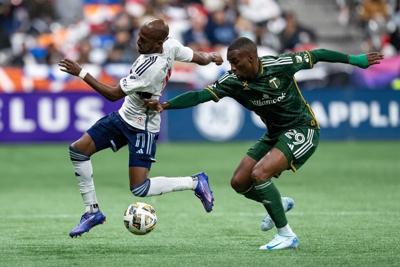 Whitecaps tie Timbers 1-1, clinch playoff berth