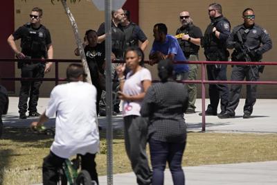 Suspect in shooting outside Vegas school faces 25 felonies