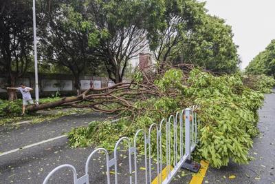 Typhoon Doksuri is downgraded to tropical storm status as it leaves southern China