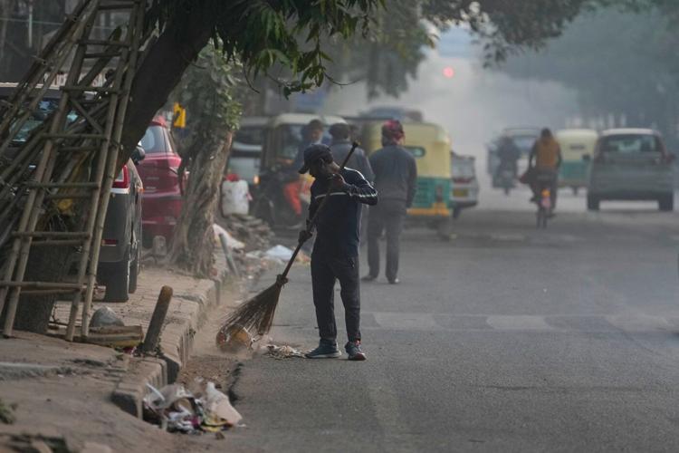Photos show the daily struggle to breathe in New Delhi's dense winter smog