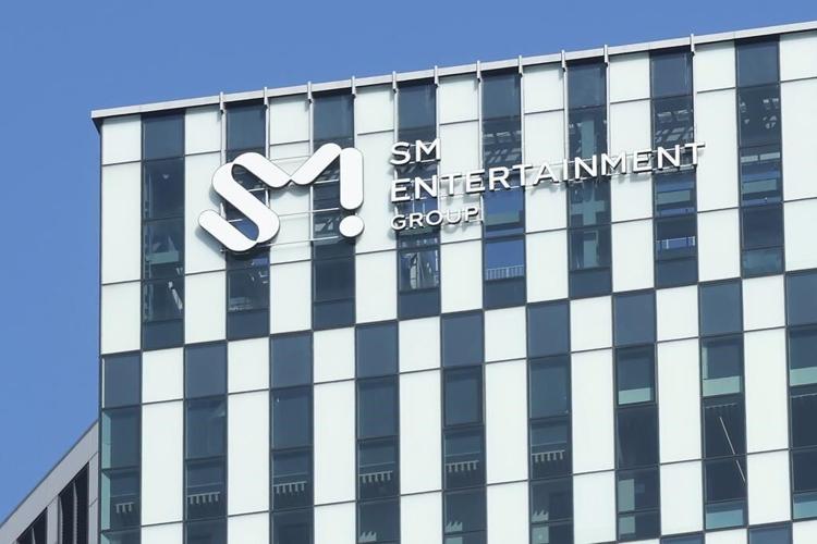 Korea's Hybe completes purchase of 14.8% stake in rival SM