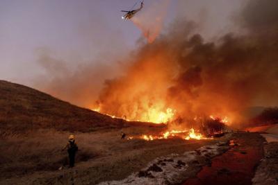 ɫֱ plane fighting L.A. fires out of service after colliding with civilian drone