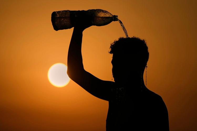 Scientists call another near-record hot year a 'warning shot' of a shifting, dangerous climate