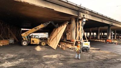 Los Angeles freeway closed after fire will reopen by Tuesday, ahead of schedule, governor says