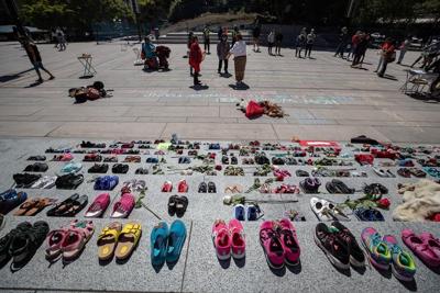 Vancouver asks artist, vigil keepers to end Indigenous children's shoe memorial